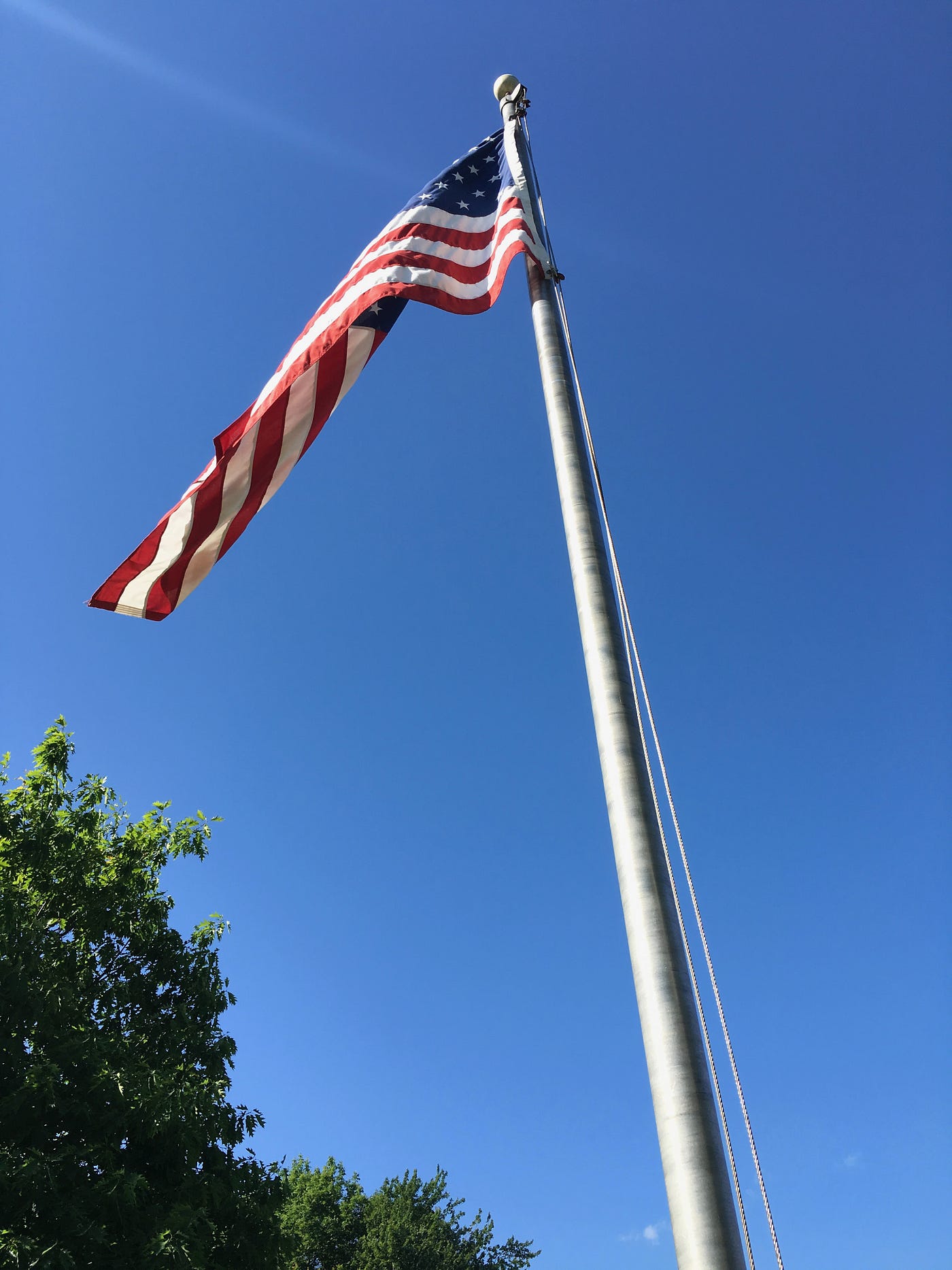 Flag outside of Harrison Lyseth Elementary School in Portland, ME